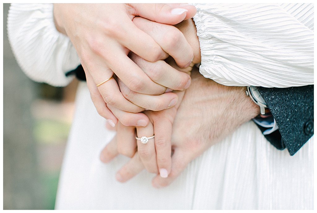 Couples hands interlocking
