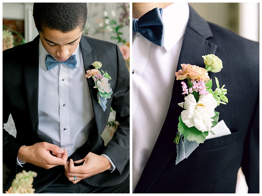 African American groom wearing a black tux and a spring floral boutonniere