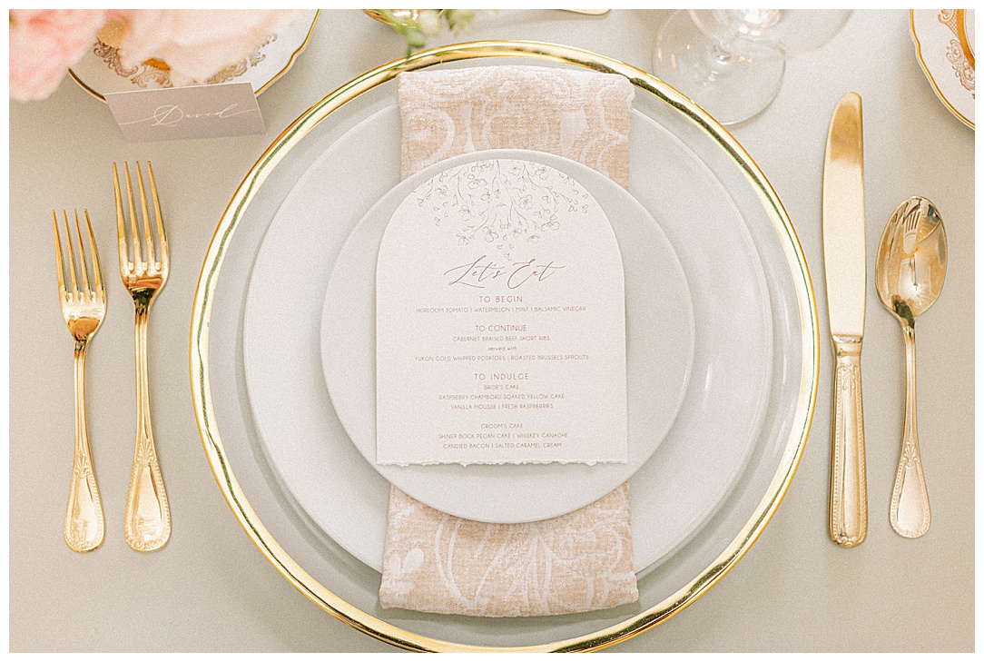 gold rimmed white diningware for classic wedding with a modern twist