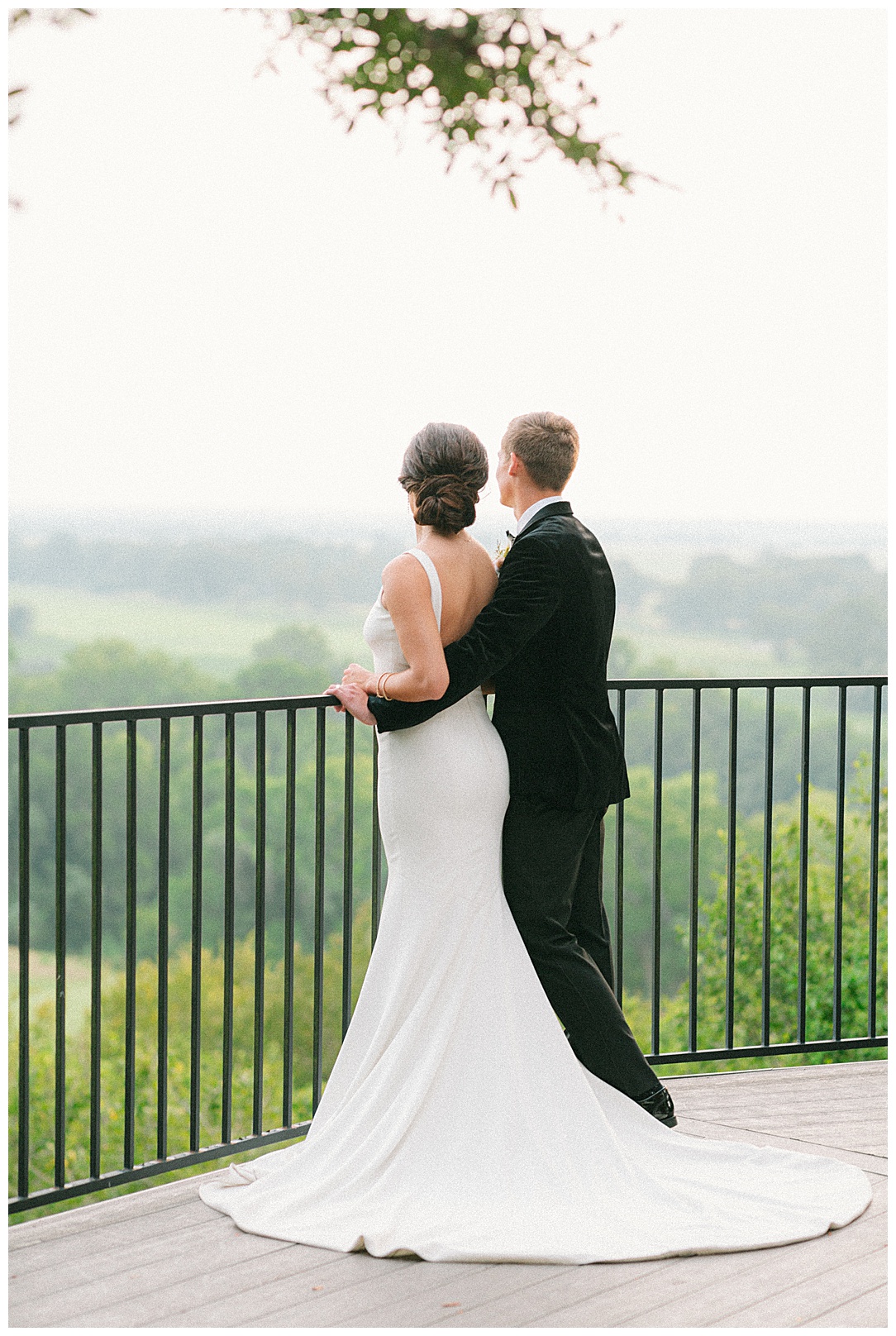 couple overlooking the balcony at the mansion at colo vista