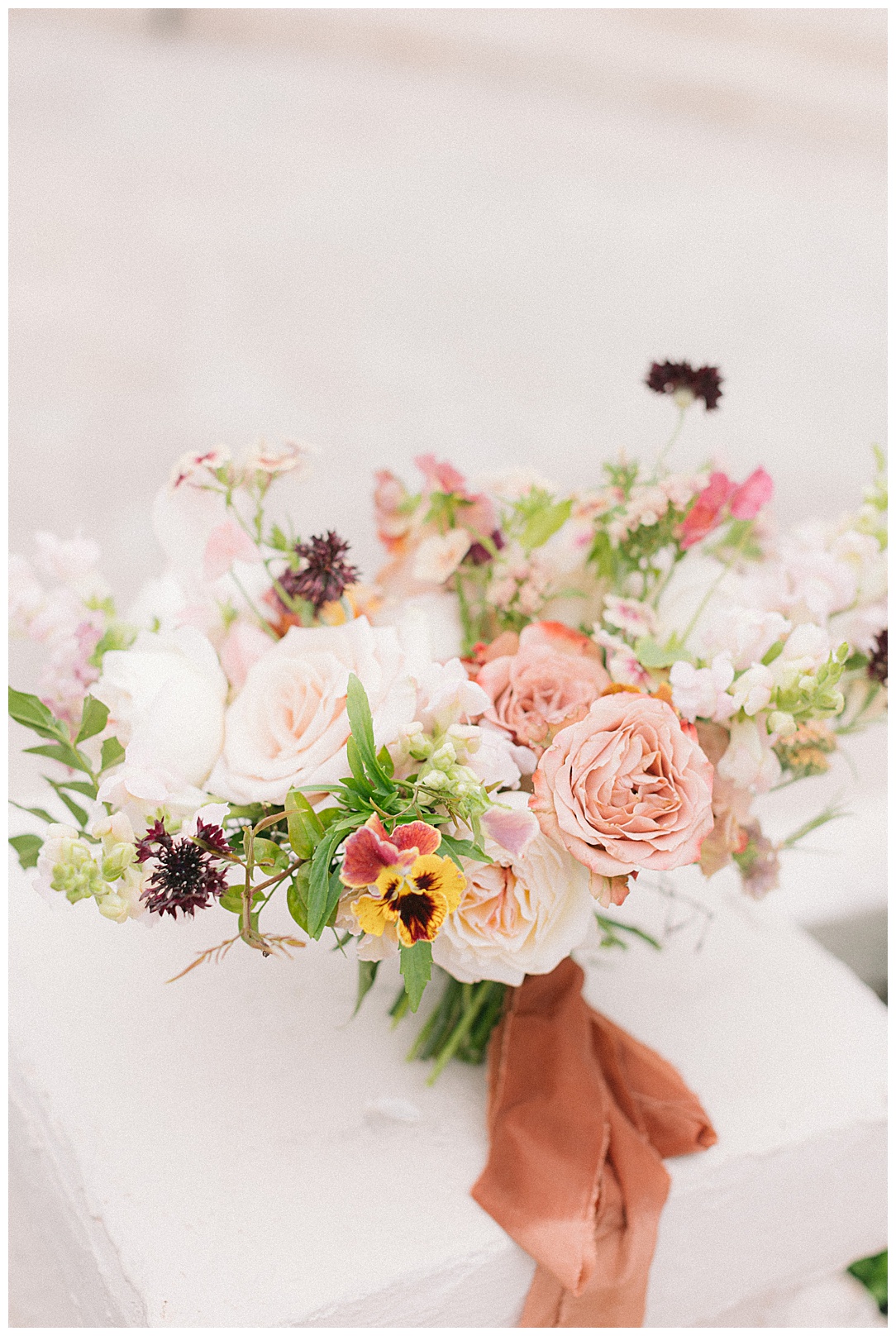 mauve white and wildflower inspired wedding bouquet