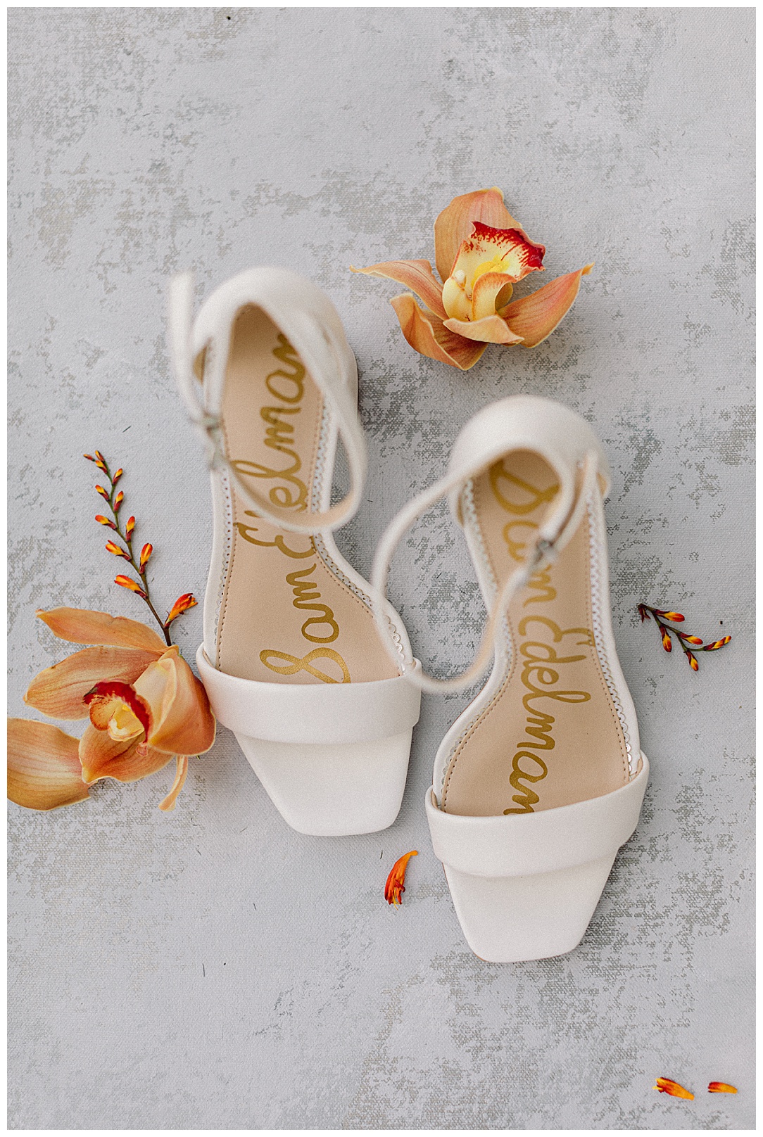 white bridal heels with orange flowers