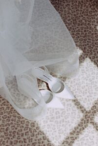 Shoes and veil for the bride of a Commodore Perry Estate wedding.
