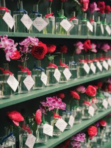 Seating chart of small bud vases for a Commodore Perry Estate Wedding.